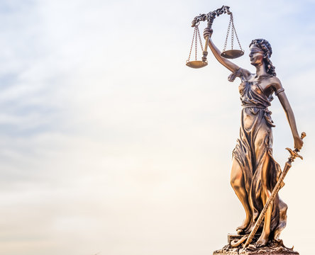 Legal law concept image - Scales of Justice and sky background