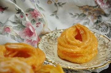 Viennese donut on a rustic saucer