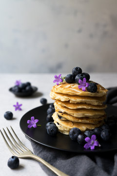 Stack of crumpets with blueberry