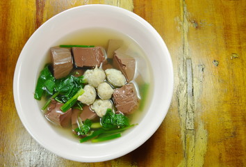 boiled pork blood with vegetable gourd and minced pork soup on bowl