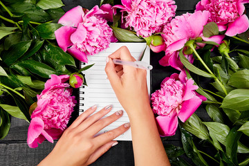 Woman hand writing diary