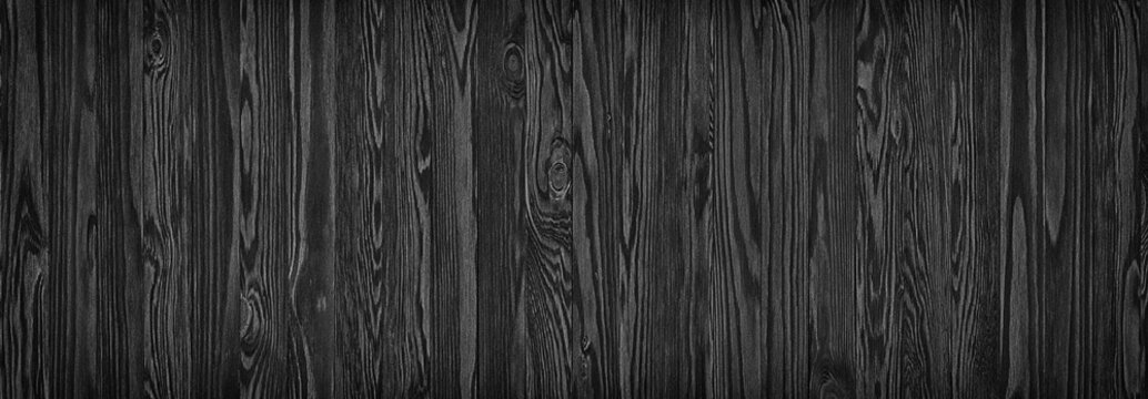 Fototapeta black wooden planks, a panorama of the wood texture with natural patterns