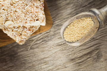 Amaranth bars in the wooden background