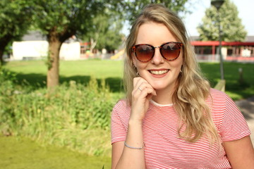 Beautiful young woman outside