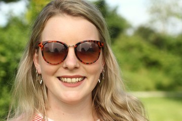 Beautiful young woman outside