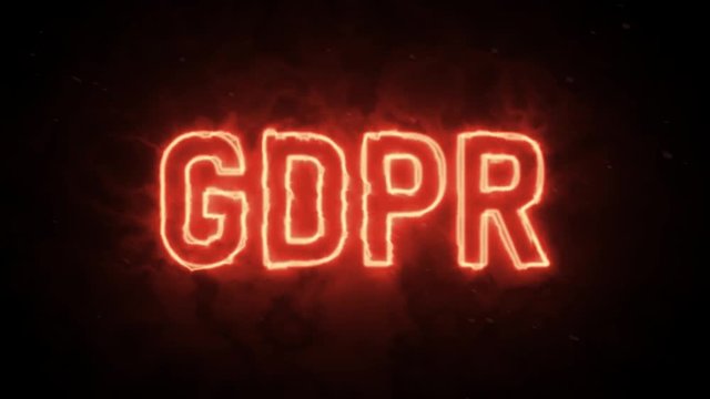 Personal data protection GDPR text symbol in hot fire on black background