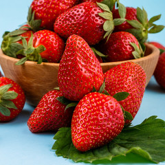 juicy fresh strawberry on a delicately blue background