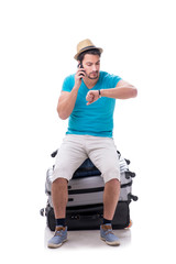 Traveler with much luggage isolated on white background