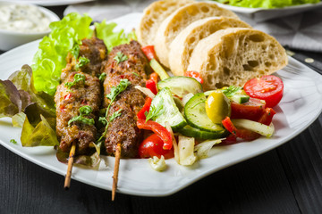 Skewers of minced meat