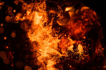 fire flames with sparks on a black background
