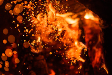 fire flames with sparks on a black background