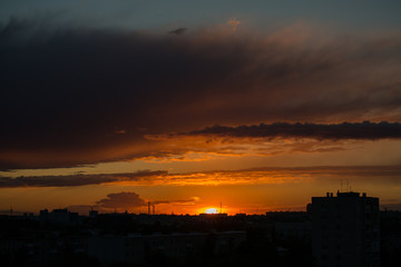 Sunset in the city with clouds