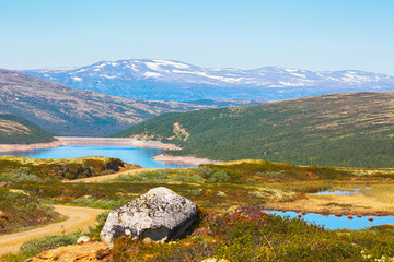 Lake Innerdalsvatnet and mountains Kvikne Bruna, located in the Rennebu district, Norway 