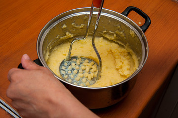 puree from potatoes, in a saucepan boiled potatoes, mash