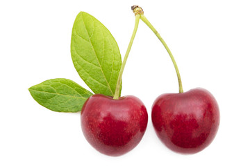 natural red cherries isolated in white background
