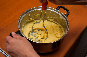 puree from potatoes, in a saucepan boiled potatoes, mash