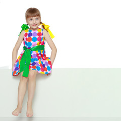 Girls looks because of the white obstacle.