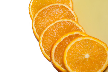 orange slices spread on a plate