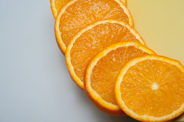 orange slices spread on a plate