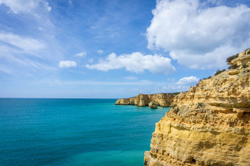 View of beautiful Marinha beach with crystal clear turquoise water near Carvoeiro town, Algarve region, Portugal