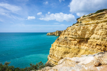 View of beautiful Marinha beach with crystal clear turquoise water near Carvoeiro town, Algarve region, Portugal