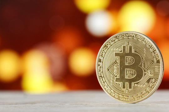 Bitcoin and light bokeh with copy space