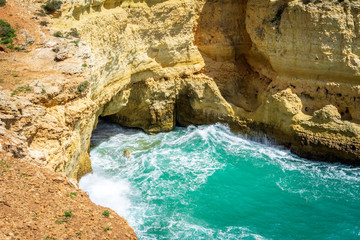 View of beautiful Marinha beach with crystal clear turquoise water near Carvoeiro town, Algarve region, Portugal
