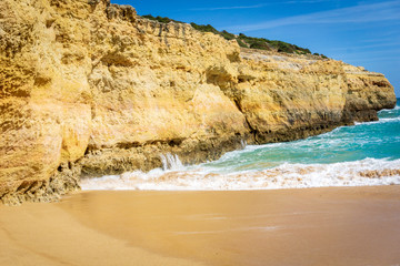 View of beautiful Marinha beach with crystal clear turquoise water near Carvoeiro town, Algarve...