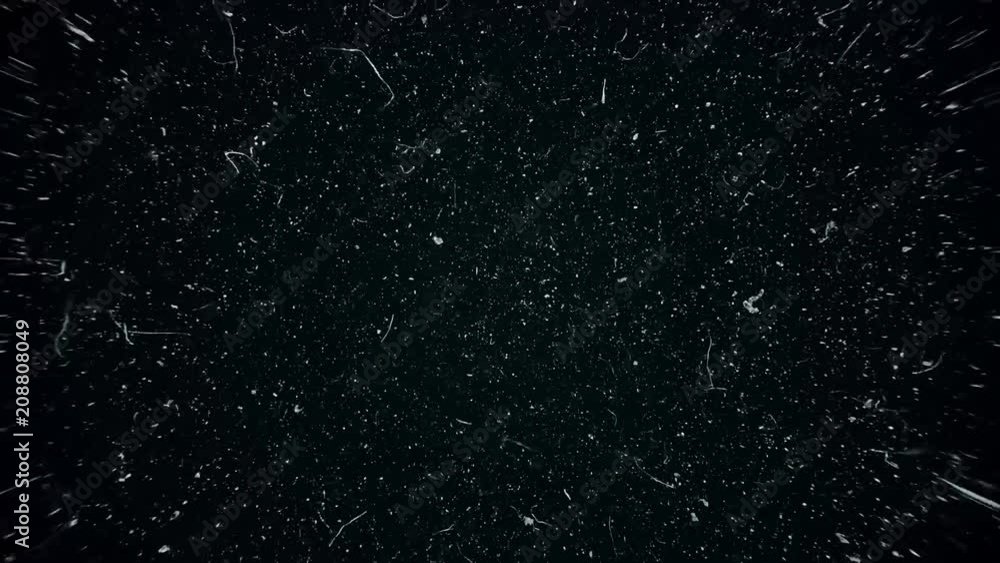 Poster white dust particles moving slowly in space on black background. abstract particle moving background