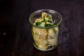 Boiled potato with sauce