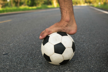 Football or soccer ball at the kickoff of a game