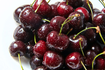 juicy red cherry with drops of water on berries