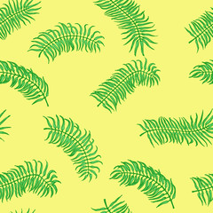 Naklejka premium Seamless tropical pattern. Palm leaves on the yellow background