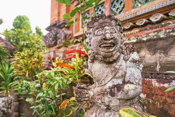 Sculpture and religion. Traditional hindu statue of demon at Bali temple.