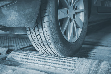 Wheel alignment and balancing in auto service.