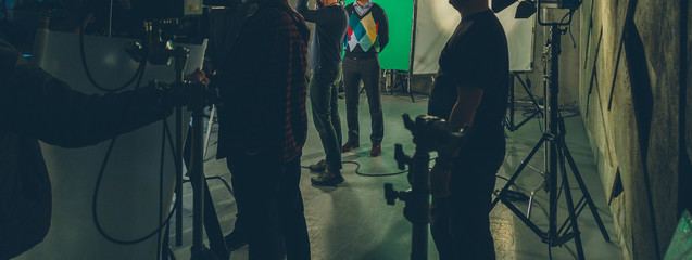 actor in studio posing on green screen