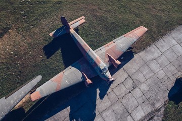 Above drone view on old WWII military propeller transport aircraft