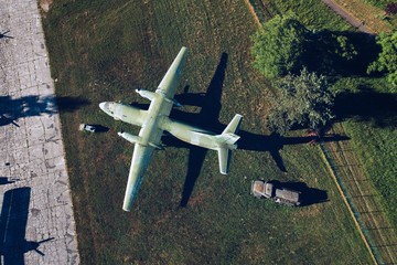 Above drone view on military propeller transport aircraft