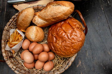 breakfast basket on wood table.