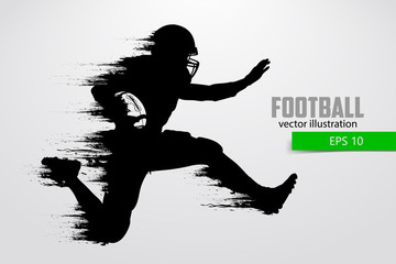 Naklejka premium Silhouette of a football player. Vector illustration