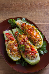Zucchini stuffed with meat, vegetables and cheese. Zucchini boats