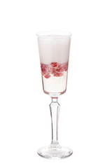 pomegranate mimosa with pomegranate grains inside and white creamy foam