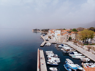 Drone shot of the Kastel old town on the coast of Dalmatia,Croatia . A famous tourist destination...