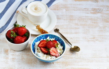 Cottage Cheese with Strawberries, Cup with Cappuccino Beverage Flowers  Wooden Background Table Kitchen, Towel Blue Bowl, Breakfast Concept
