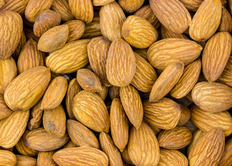 set almonds roasted without shell pattern natural whole grains of walnut close-up background