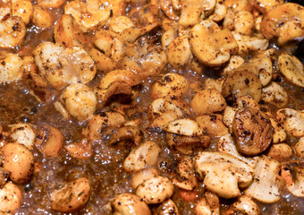 half mushroom pile of mushrooms in marinade sauce delicious appetizing julienne