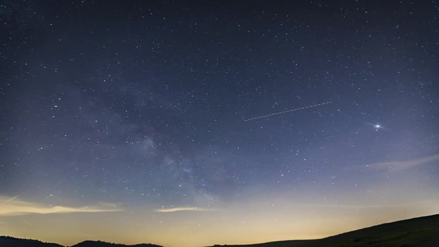 Milky Way stock video features amazing time-lapse footage of the Milky Way passing over the nights sky. You can also see satellites and shooting stars.