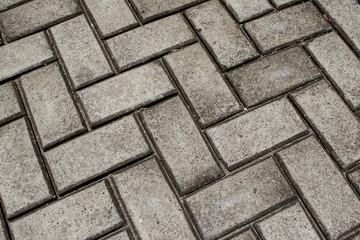 Grey Cement Tile Work on a Floor with Diagonal Pattern