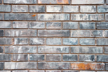 Grey brick wall textured background.