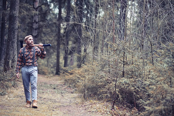 A bearded lumberjack with a large ax